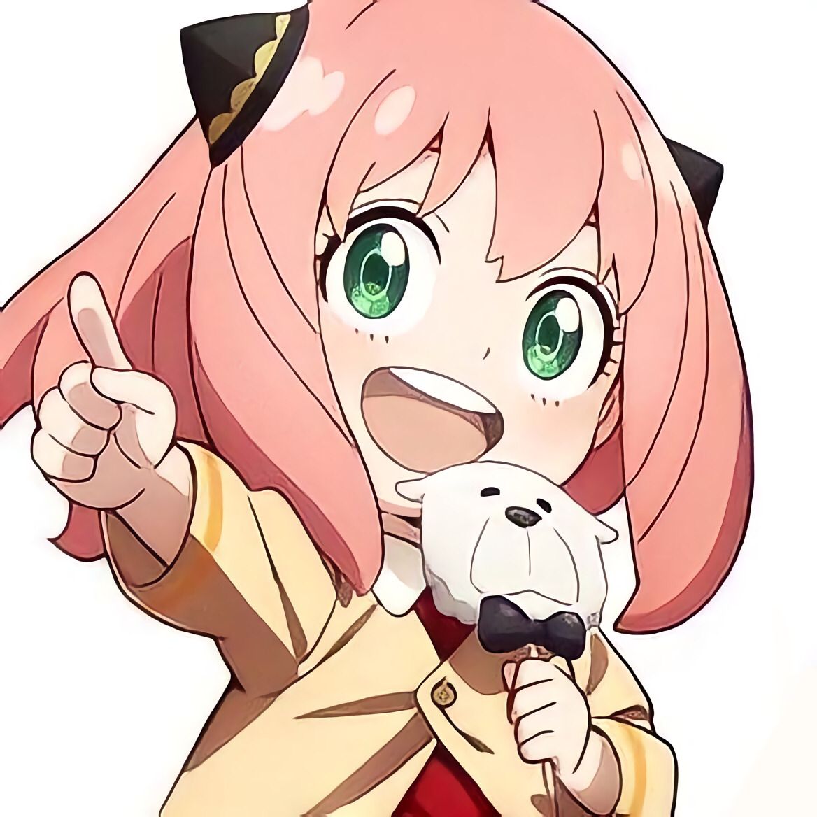 Ảnh Anya cầm kẹo gấu mặc áo vàng