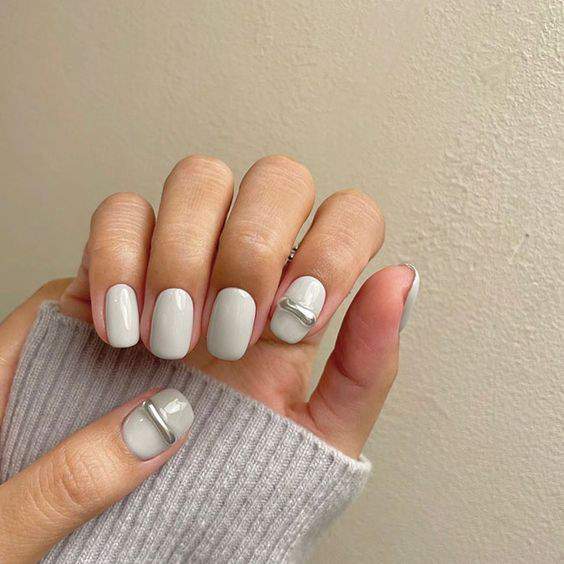Mẫu nail nơ kết hợp với kim cương