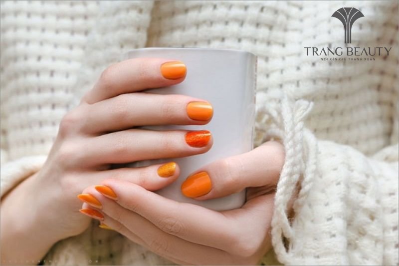 Mẫu nail trơn cam được nhiều chị em yêu thích