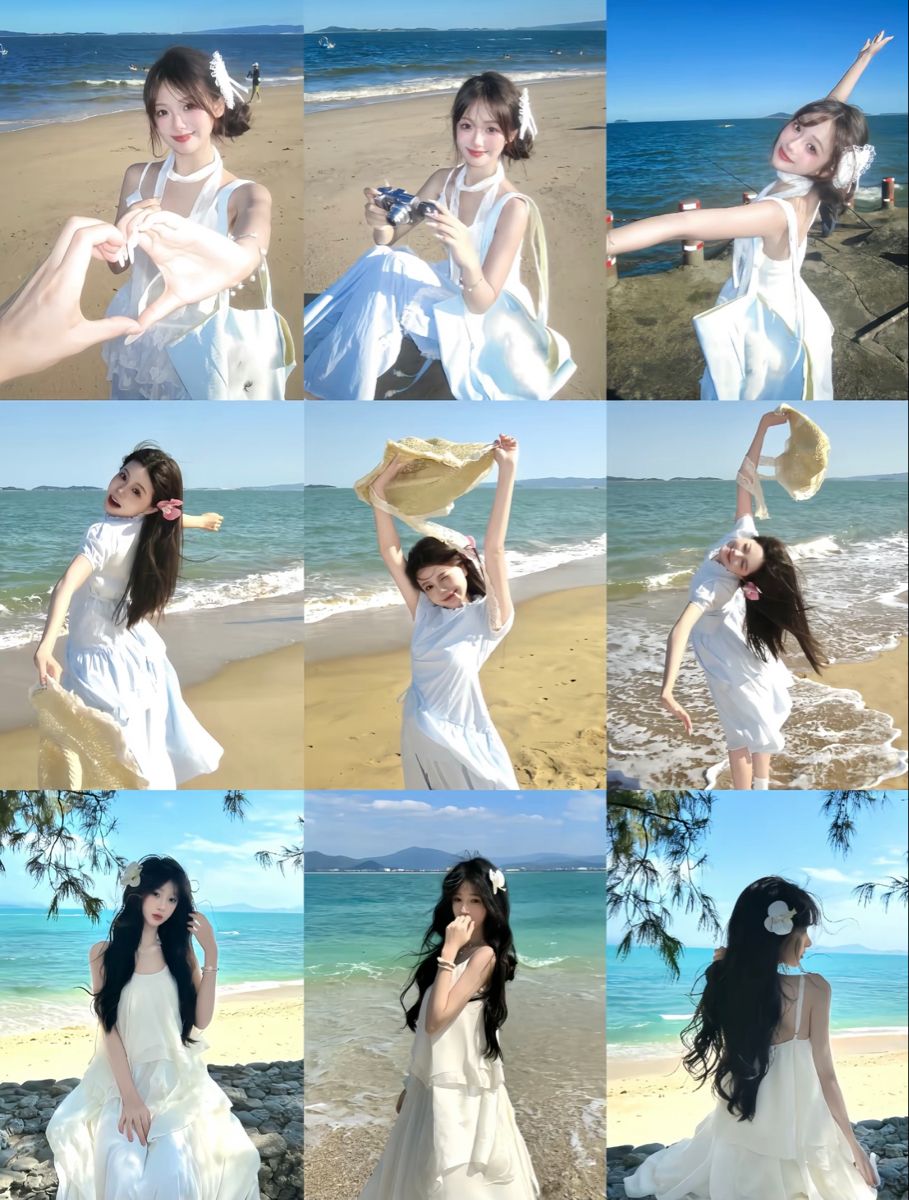 Kéo nhẹ tà váy khi đứng nghiêng nhìn về phía biển