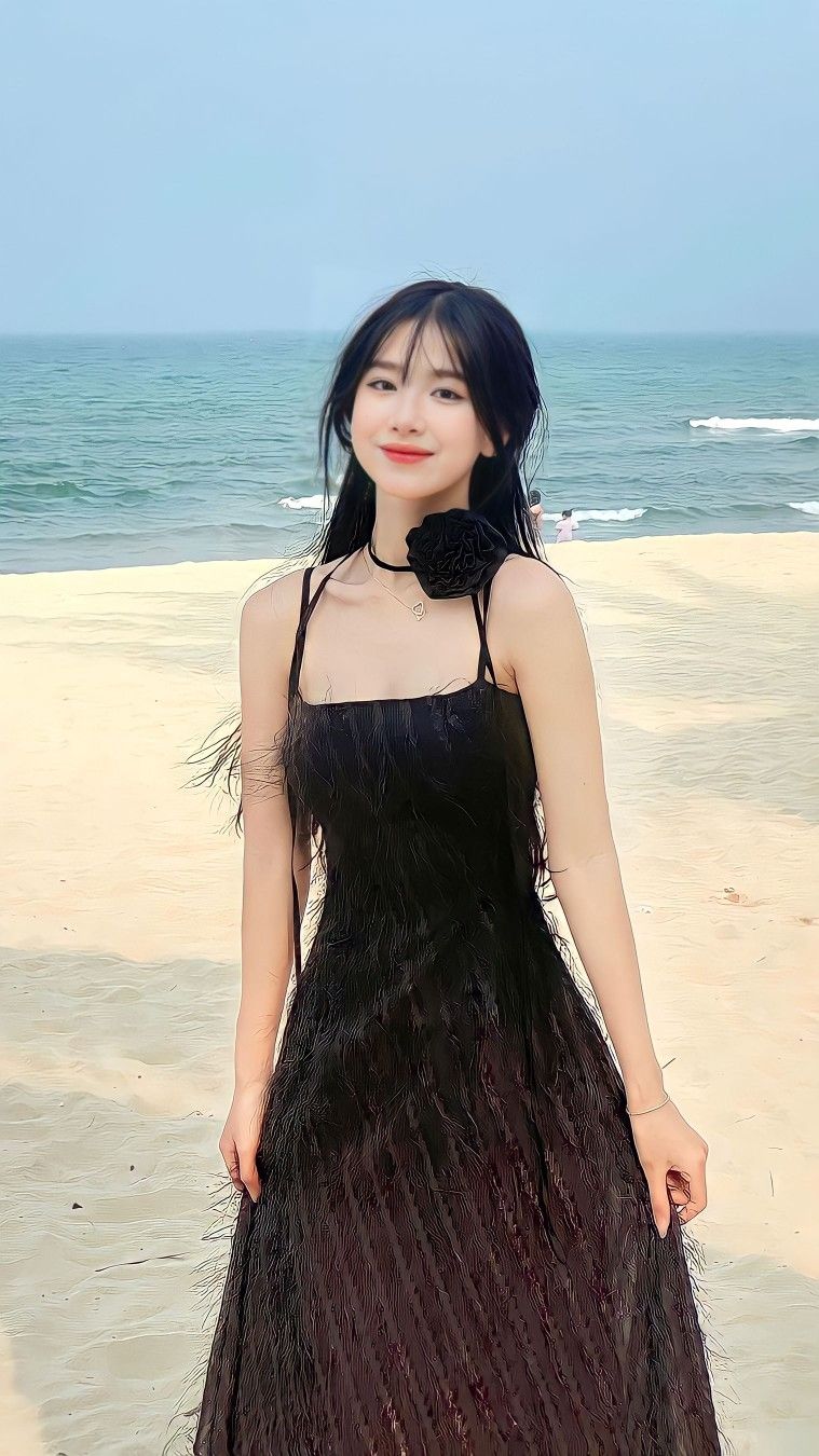 Cách tạo dáng với váy khi chụp biển