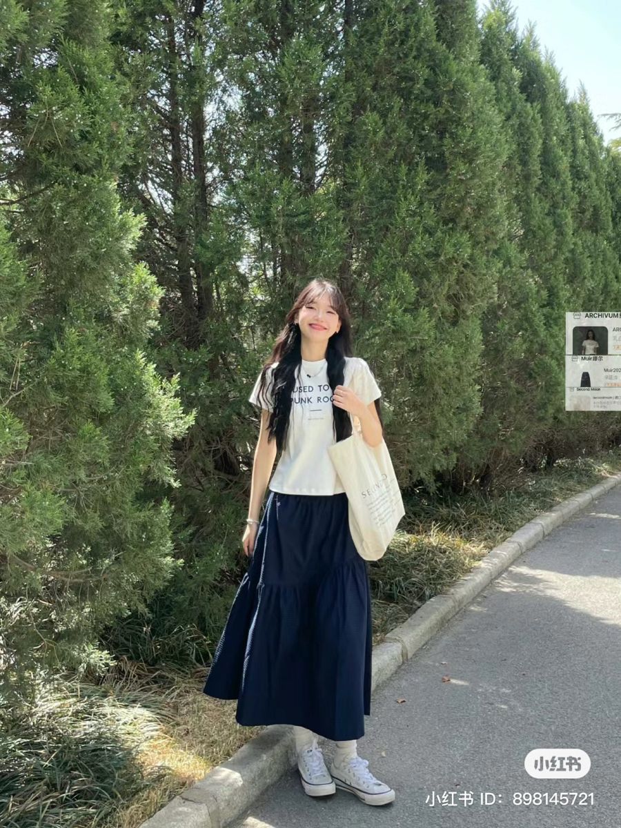 Cách tạo dáng tự tin cùng váy dài