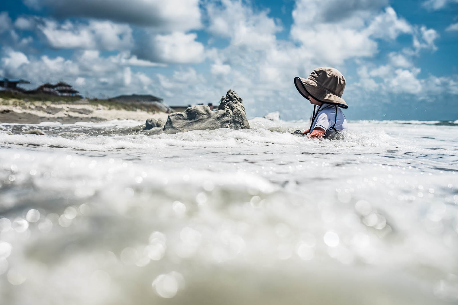 pic of toddler sitting in the water by Susan Grimes