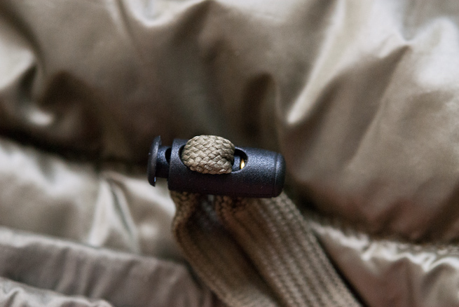 UNIQLO ULD down gilet Stuff sack cord-lock detail.