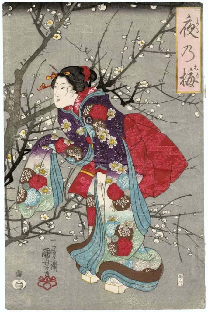 a mejiro bird eating an ume flower